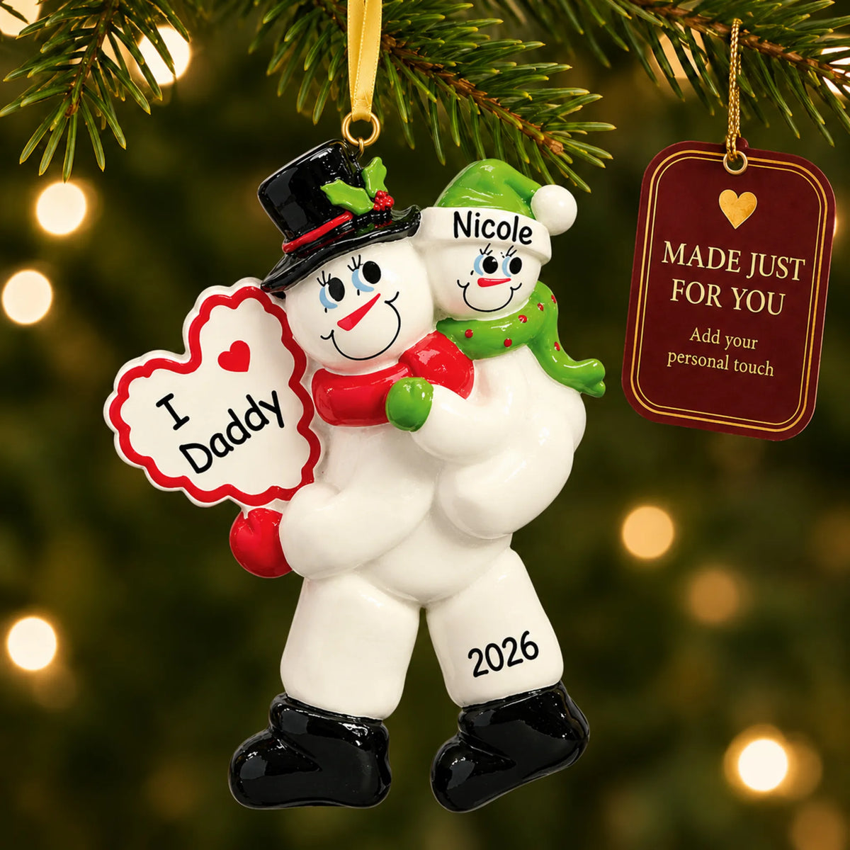 I love daddy christmas ornament hanging on a lit Christmas tree with a Made Just For You gift tag