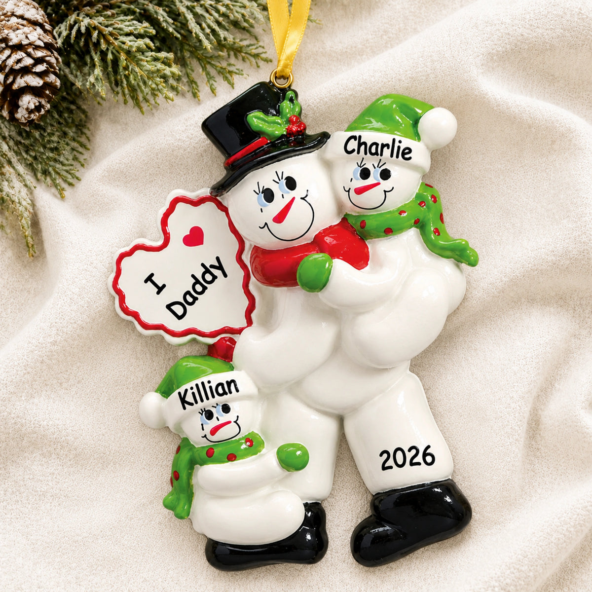 Personalized I Love Daddy 2 kids Christmas ornament hanging on tree with kids names and 2026