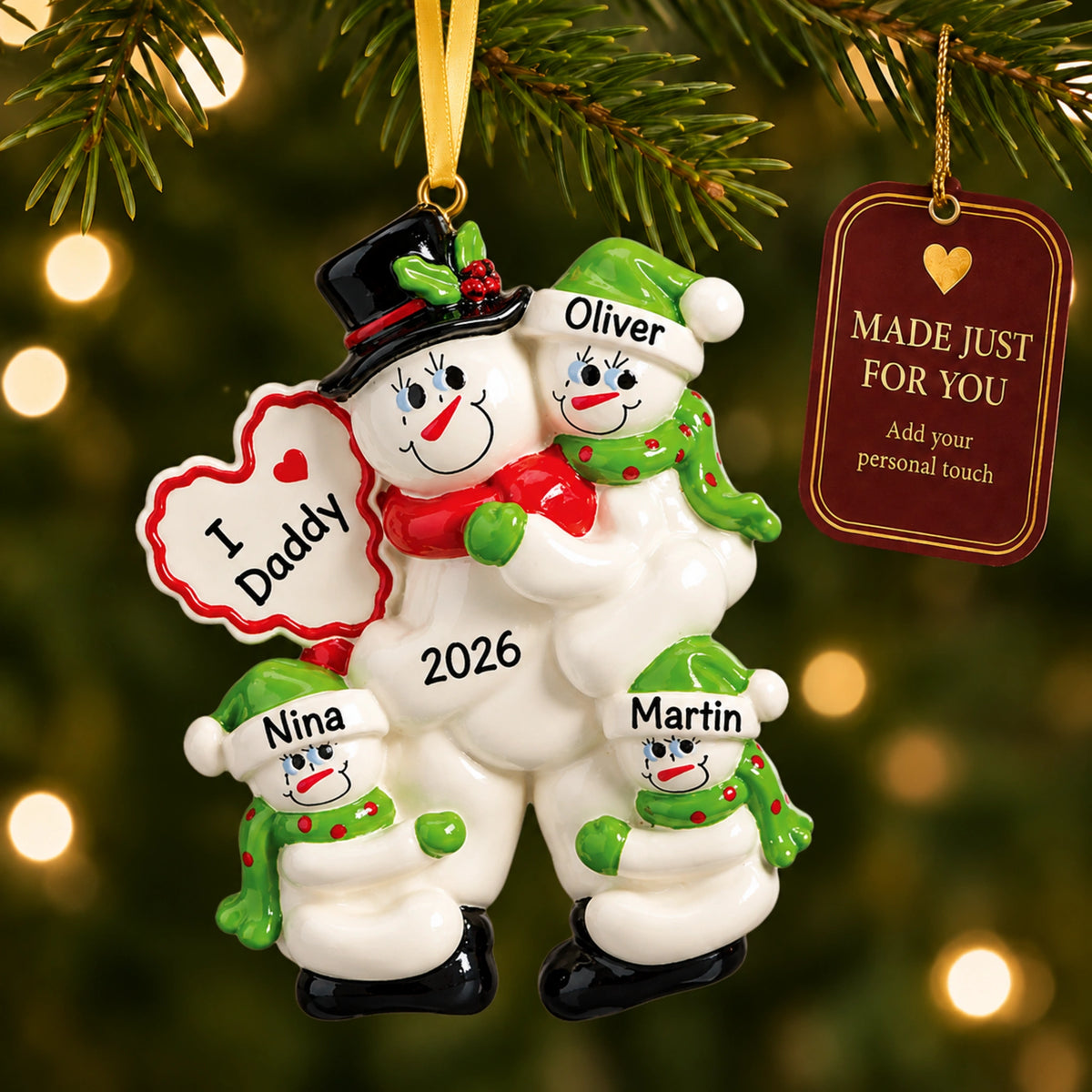 Personalized I Love Daddy christmas ornament hanging on the tree, made just for you with your names