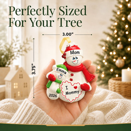 Personalized I Love Mommy christmas ornament held in hand, about 3.75 inches, perfectly sized for your tree