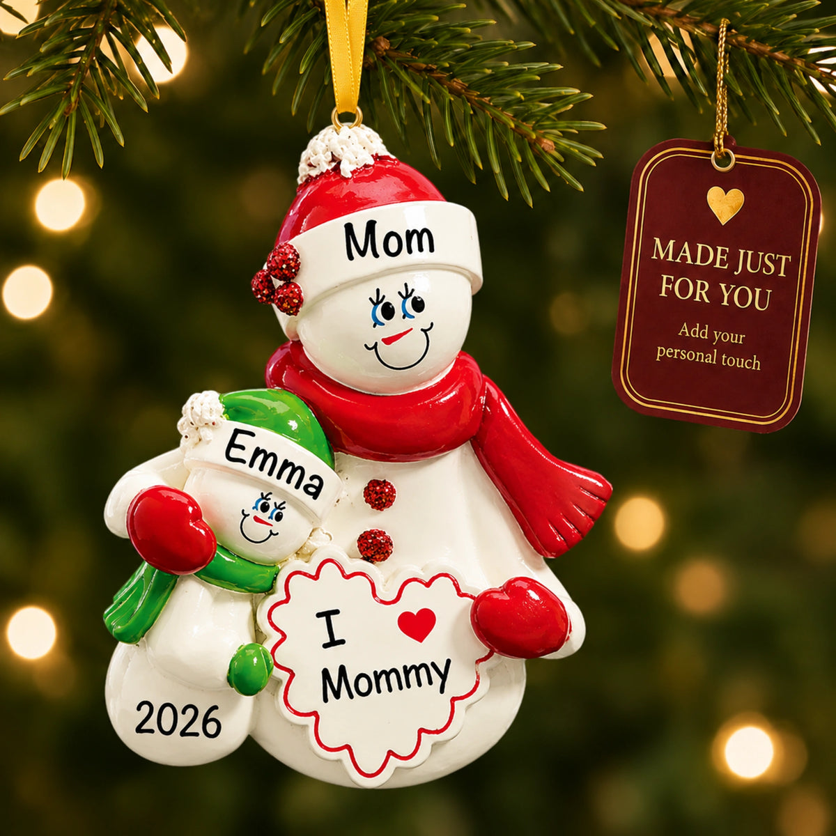 Personalized I Love Mommy christmas ornament hanging on the tree, made just for you with your names
