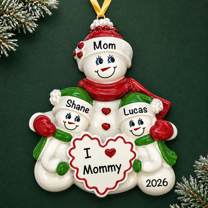 Personalized i love mommy christmas ornament on a dark green pine background