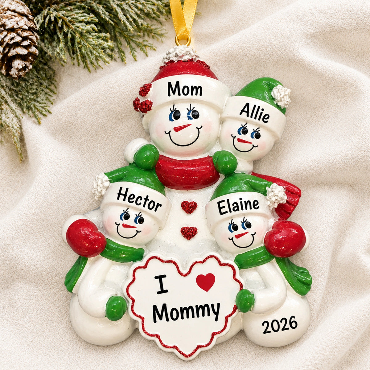 Personalized I Love Mommy 3 kids Christmas ornament hanging on tree with kids names and 2026