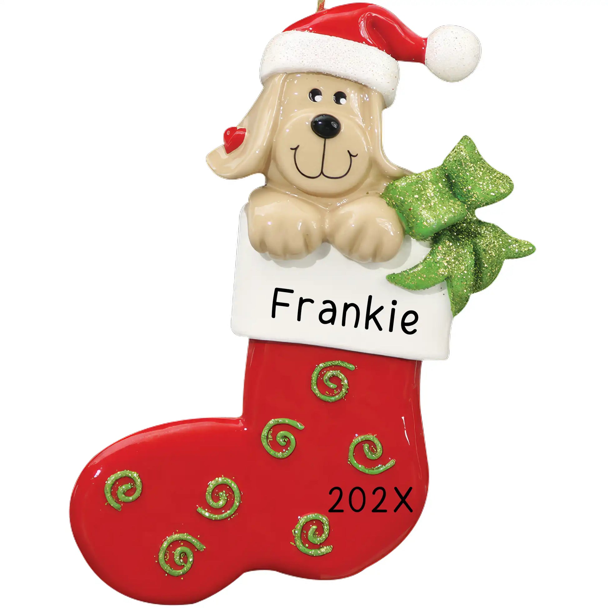 A personalized Christmas ornament featuring a tan dog in a red stocking with green bow and swirls, and the name 'Frankie 202x' printed on the stocking.