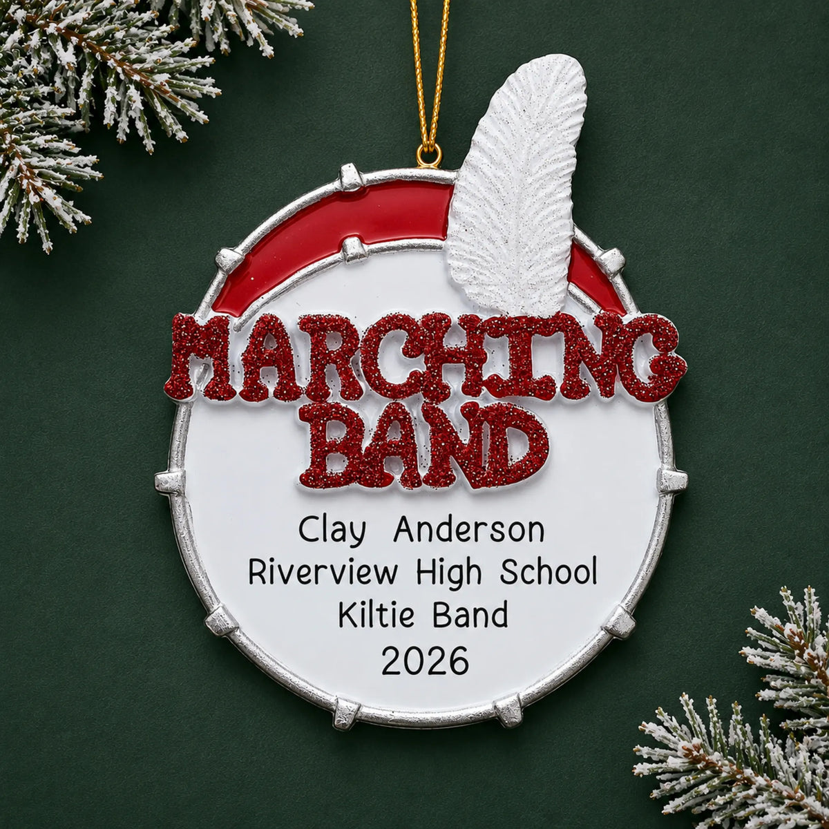Personalized marching band christmas ornament on a dark green pine background