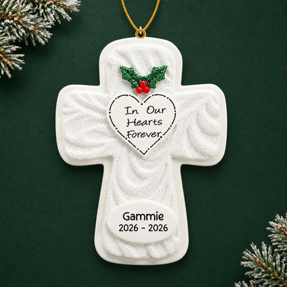 Personalized Memorial Cross christmas ornament on a dark green pine background