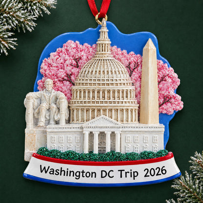 Personalized Washington DC christmas ornament on a dark green pine background