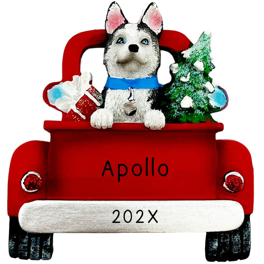 A personalized Christmas tree decoration featuring a Siberian Husky in a vintage red truck.