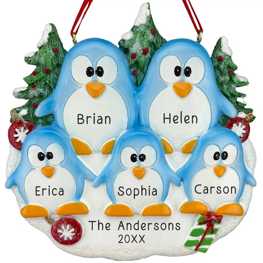 Personalized penguin family of five ornament with names, snowy background, and decorated trees