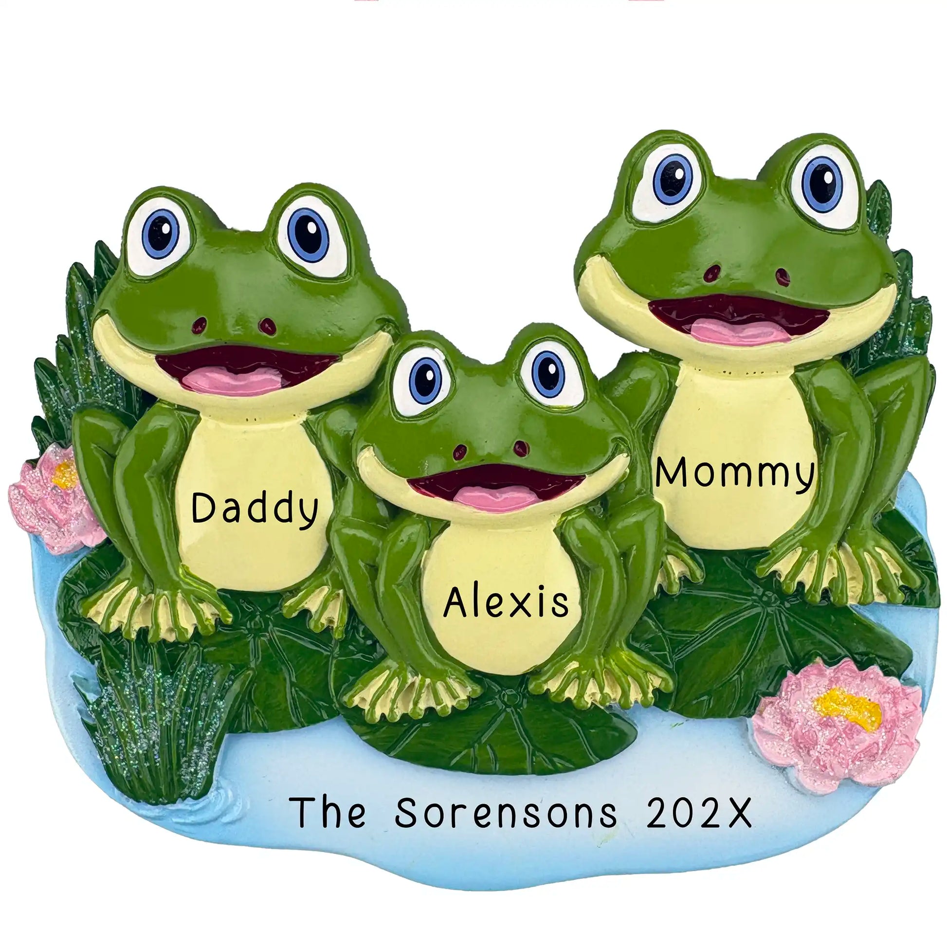 Family of 3 frogs ornament sitting on lily pads surrounded by pink flowers personalized with names and year