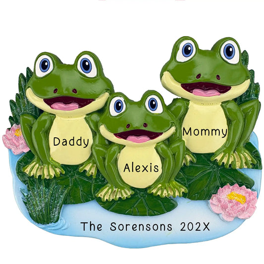 Family of 3 frogs ornament sitting on lily pads surrounded by pink flowers personalized with names and year