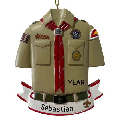 Personalized Boy Scout ornament featuring classic khaki uniform, red necktie, and scout badges with customizable name and year.