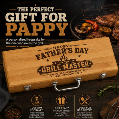 Wooden grill bbq set with engraved message for Father's Day on a grill background