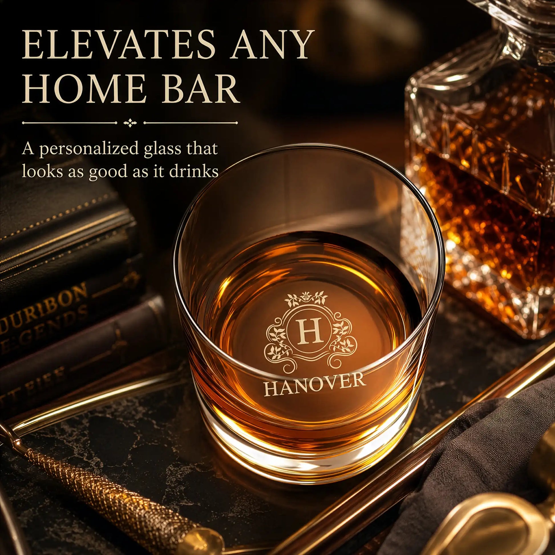 Personalized whiskey rocks glass styled on a home bar tray with crystal decanter and leather books