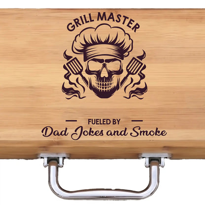 Wooden bbq set case with 'Grill Master' skull design on a white background