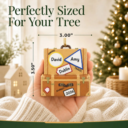 Size guide: the personalized travel suitcase christmas ornament is 3.00 in wide by 3.50 in tall, shown in hand
