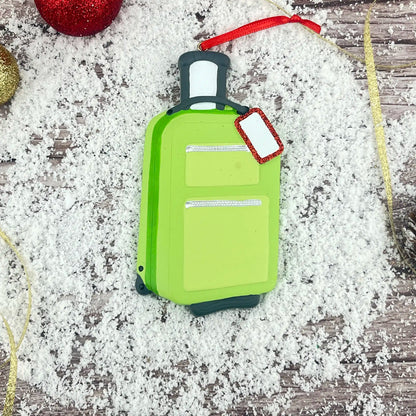 Adorno navideño de maleta de viaje verde