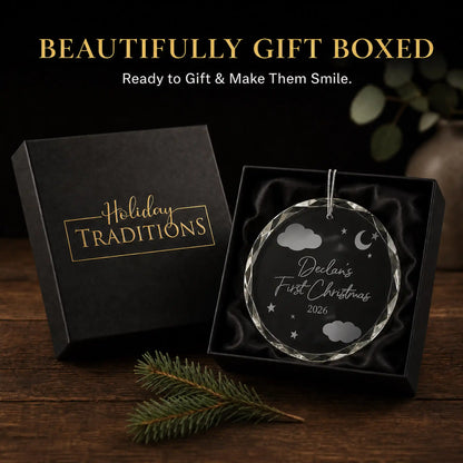 Personalized baby's first Christmas glass ornament arrives in a black Holiday Traditions gift box, ready to give