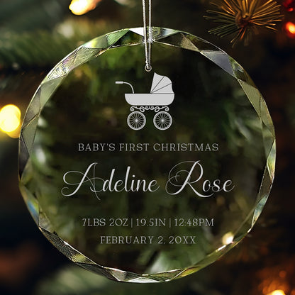 Personalized crystal ornament engraved with baby carriage design, name, and birth details for Baby’s First Christmas