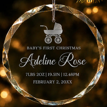 Baby's first Christmas glass ornament with a baby carriage design, laser engraved with baby's name and birth details