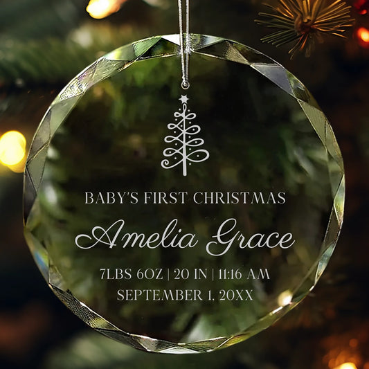 Personalized crystal ornament engraved with baby’s name, birth details, and Christmas tree design for Baby’s First Christmas.