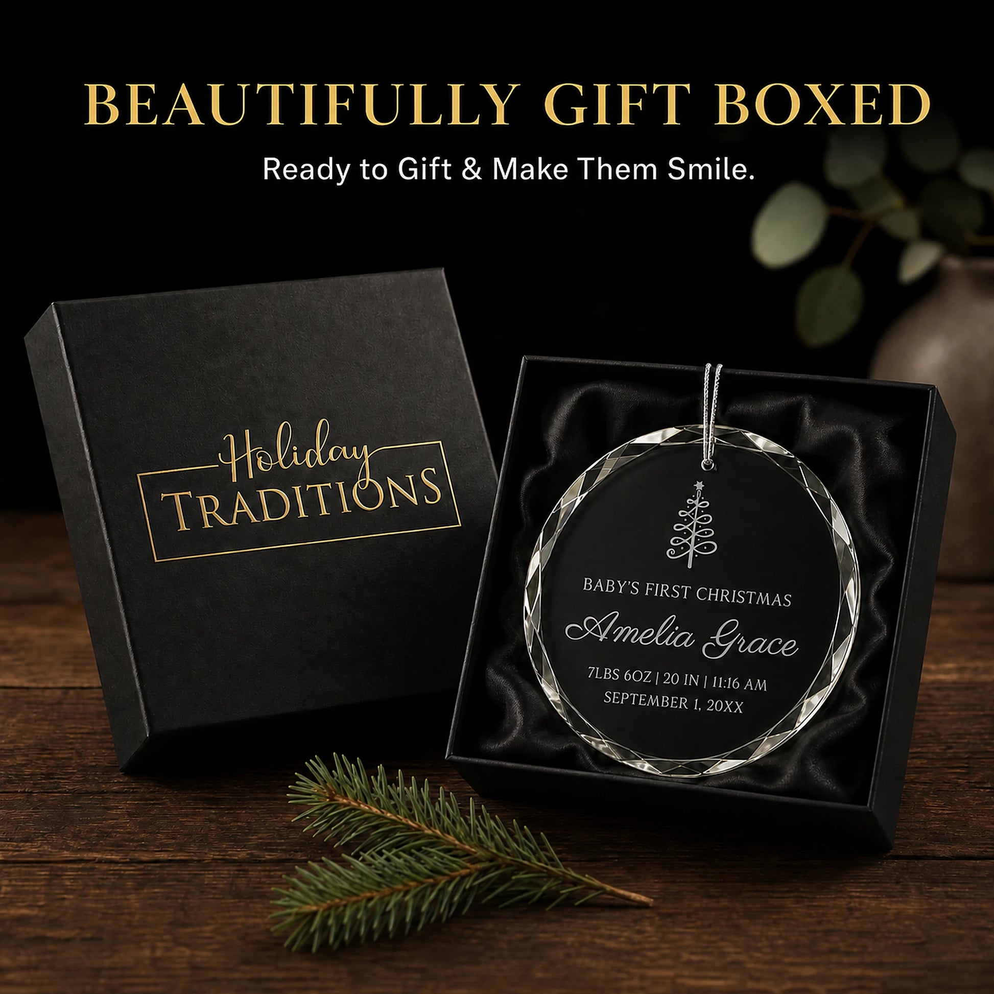 Christmas tree personalized baby's first Christmas glass ornament arrives in a black Holiday Traditions gift box, ready to give