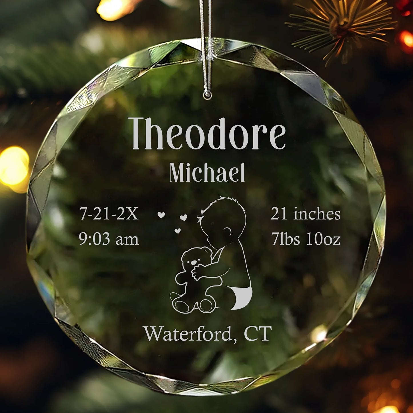 Personalized crystal ornament engraved with baby boy and teddy bear design, name, birth stats, and location