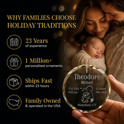 Parents holding their newborn and the baby and teddy bear personalized baby's first Christmas glass ornament, Holiday Traditions is family owned in the USA and ships within 23 hours