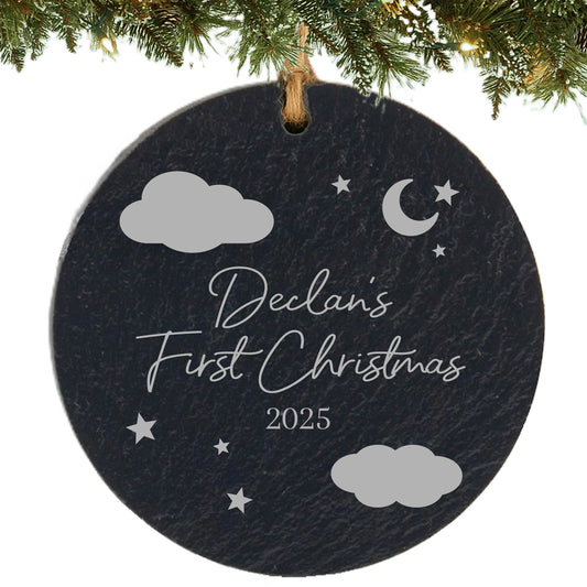 Slate ornament engraved with clouds, stars, moon, baby’s name, and “First Christmas” with the year.