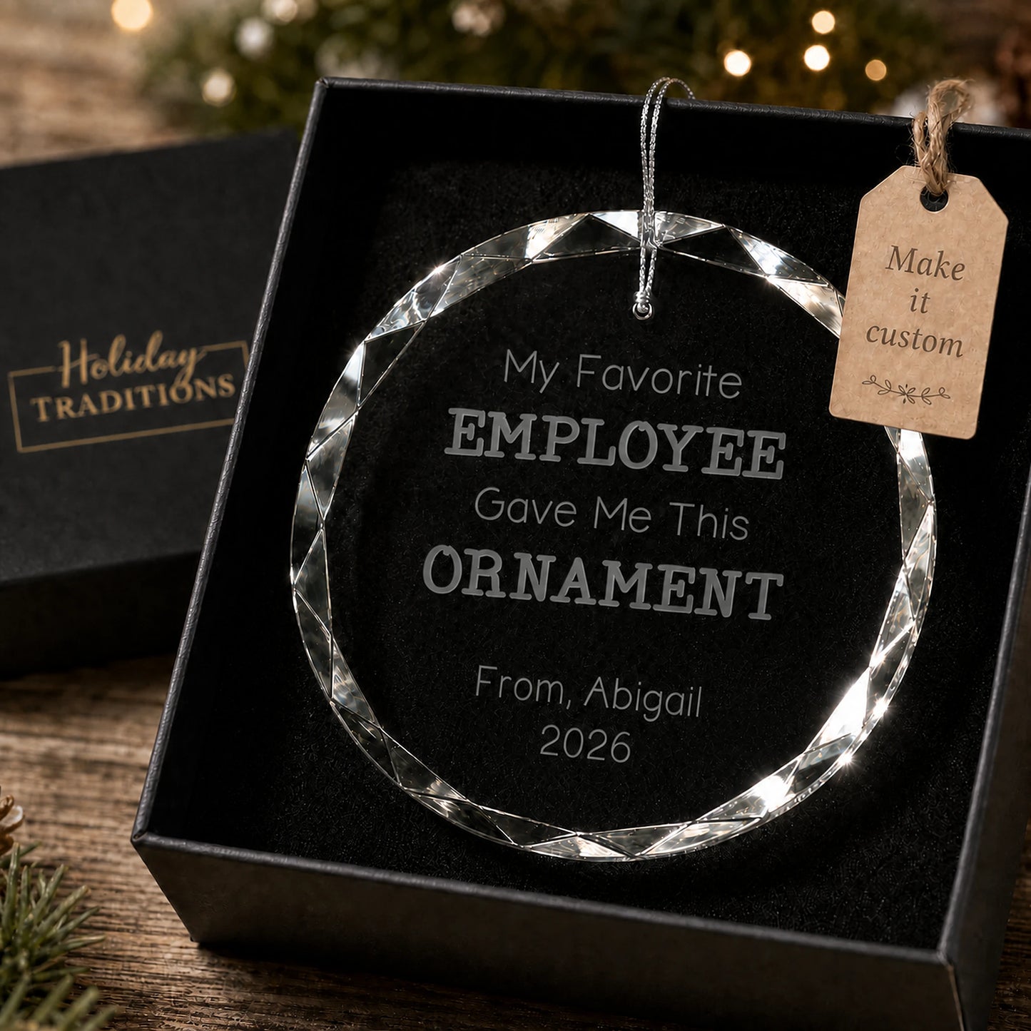 My Favorite Employee Gave Me This Ornament personalized glass ornament, laser engraved with the giver's name and year, shown in its black gift box
