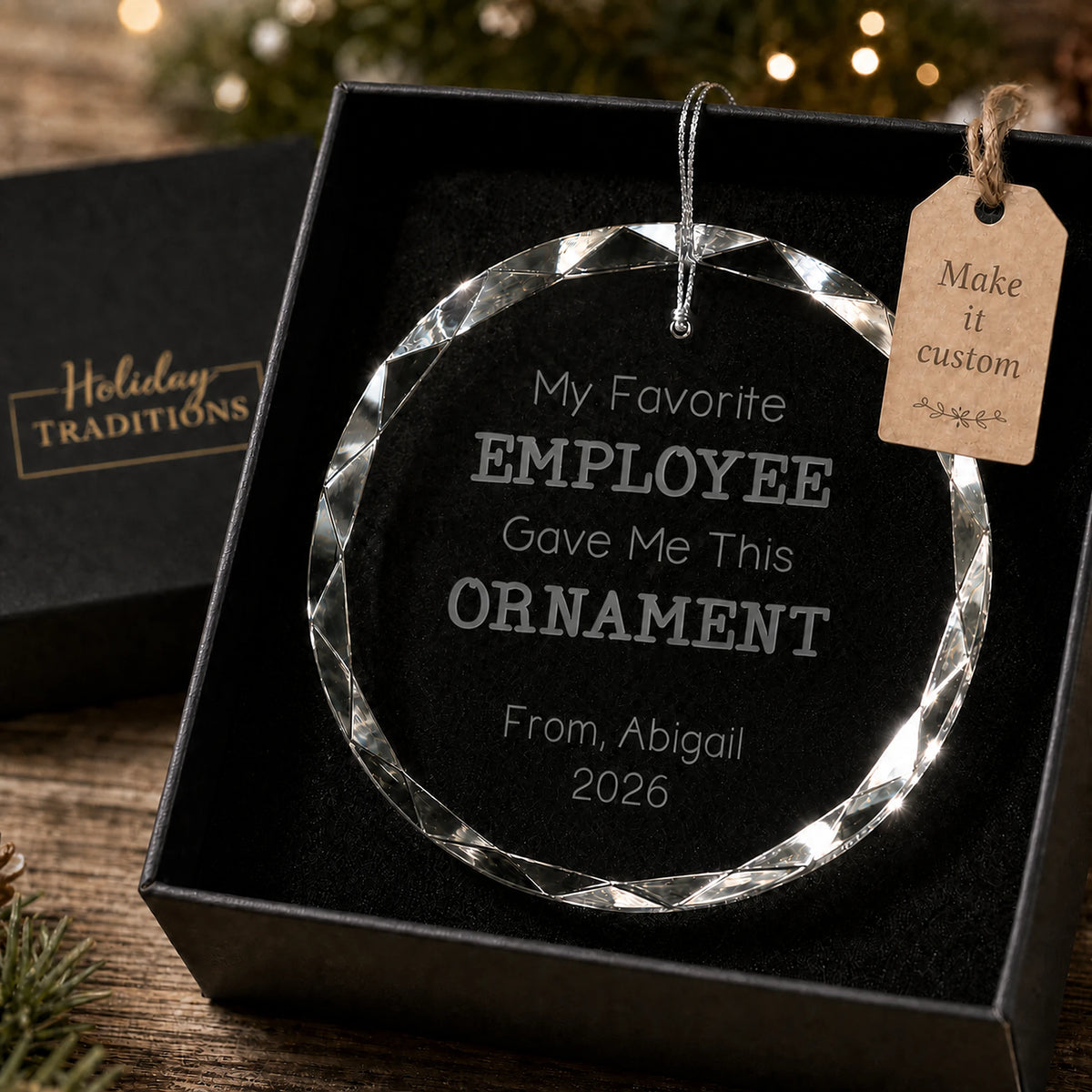 My Favorite Employee Gave Me This Ornament personalized glass ornament, laser engraved with the giver's name and year, shown in its black gift box