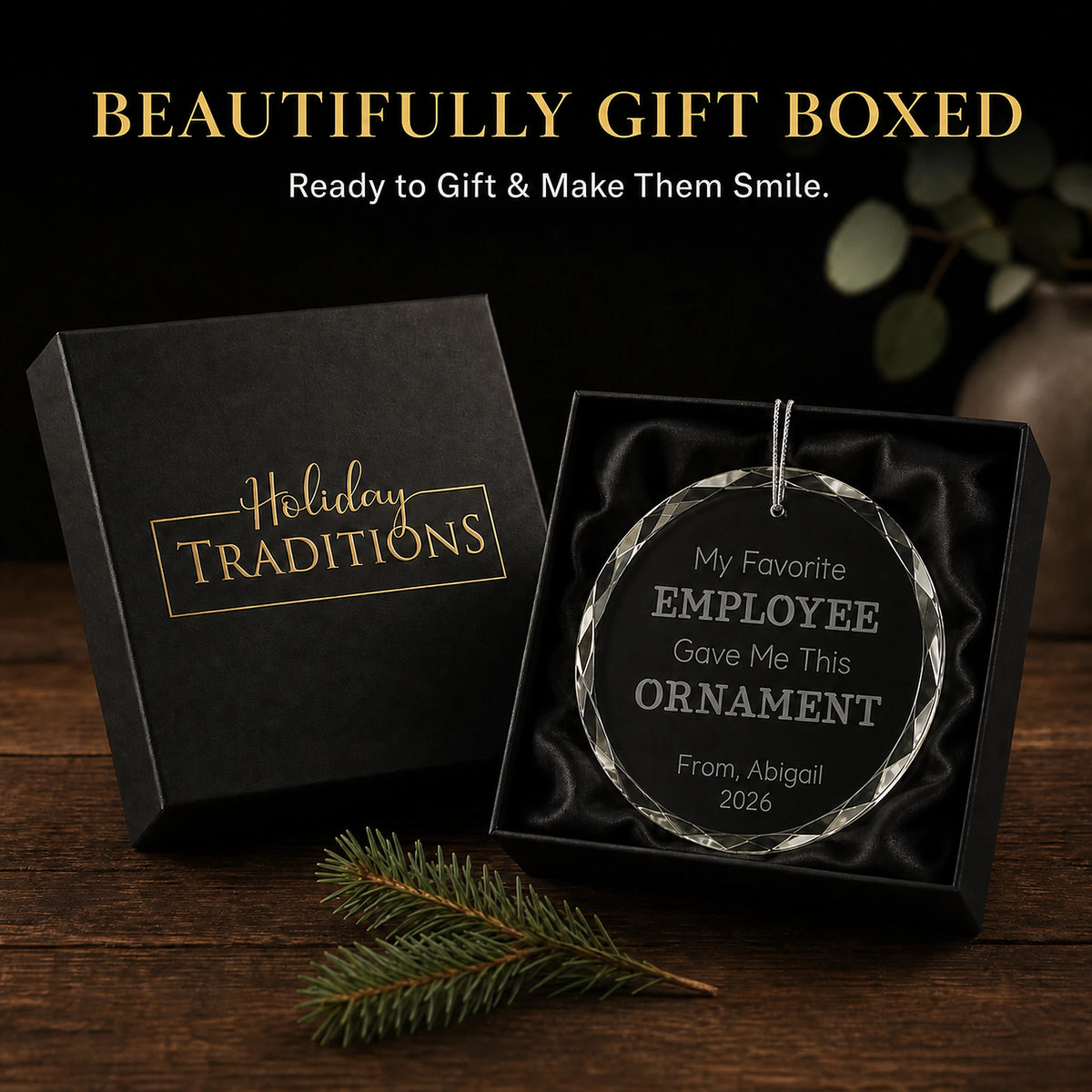 Personalized My Favorite Employee glass ornament arrives in a black Holiday Traditions gift box, ready to give