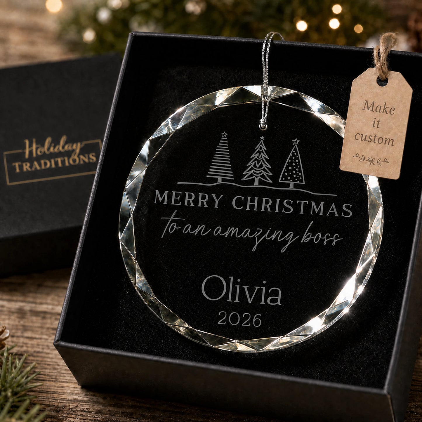 Amazing Boss personalized Christmas ornament in K9 optical glass with three Christmas trees, laser engraved with Merry Christmas to an amazing boss, name and year, shown in its black gift box