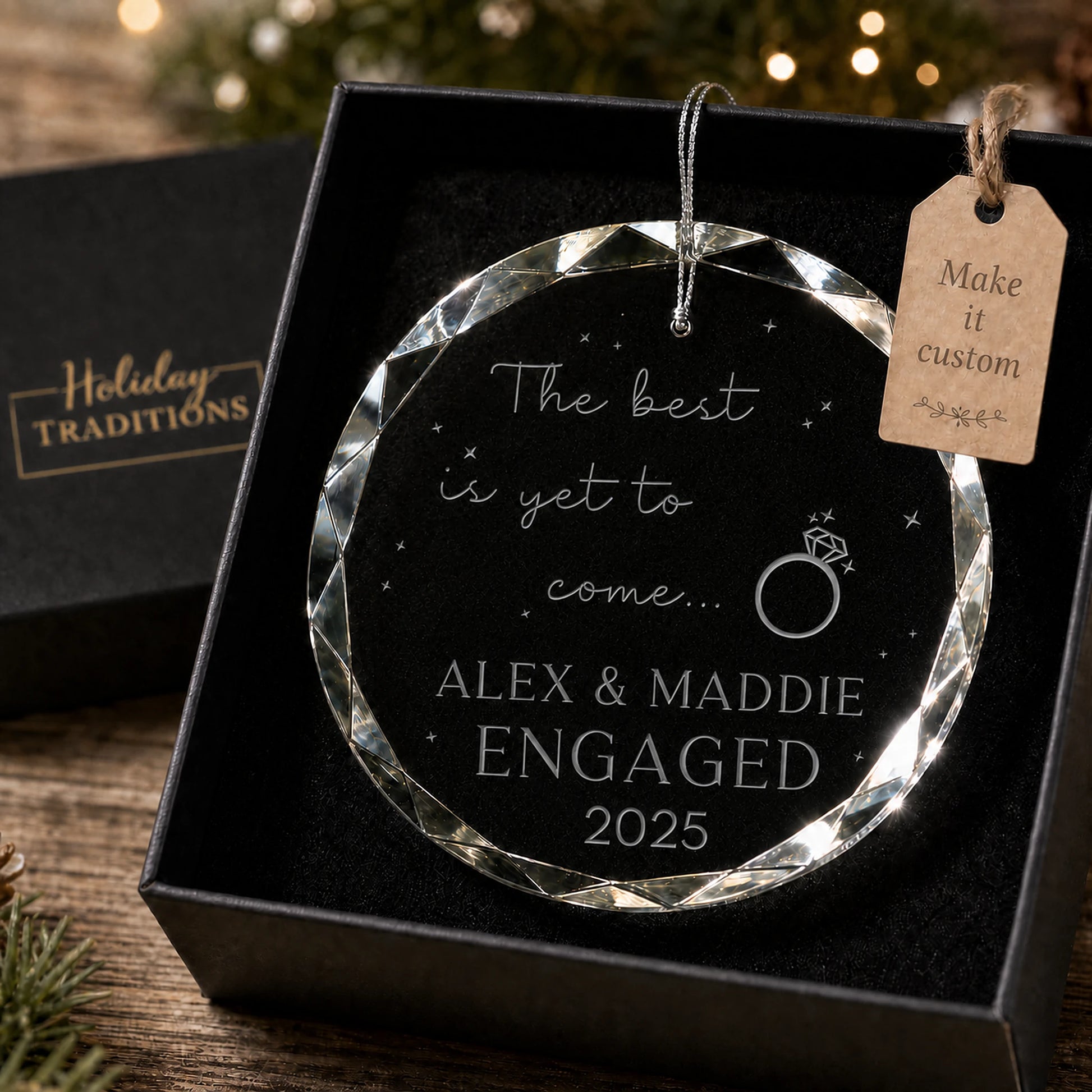 The Best Is Yet to Come engagement personalized glass ornament with a ring design, laser engraved with the couple's names, Engaged and year, shown in its black gift box