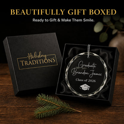 Graduate personalized glass ornament arrives in a black Holiday Traditions gift box, ready to give