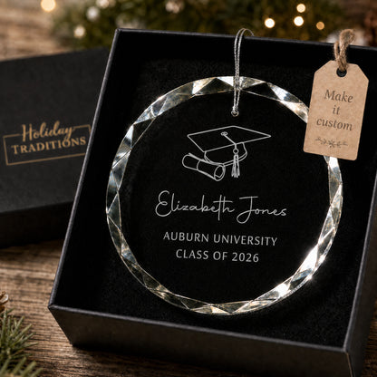 Graduation cap and diploma personalized glass ornament, laser engraved with name, school and class year, shown in its black gift box