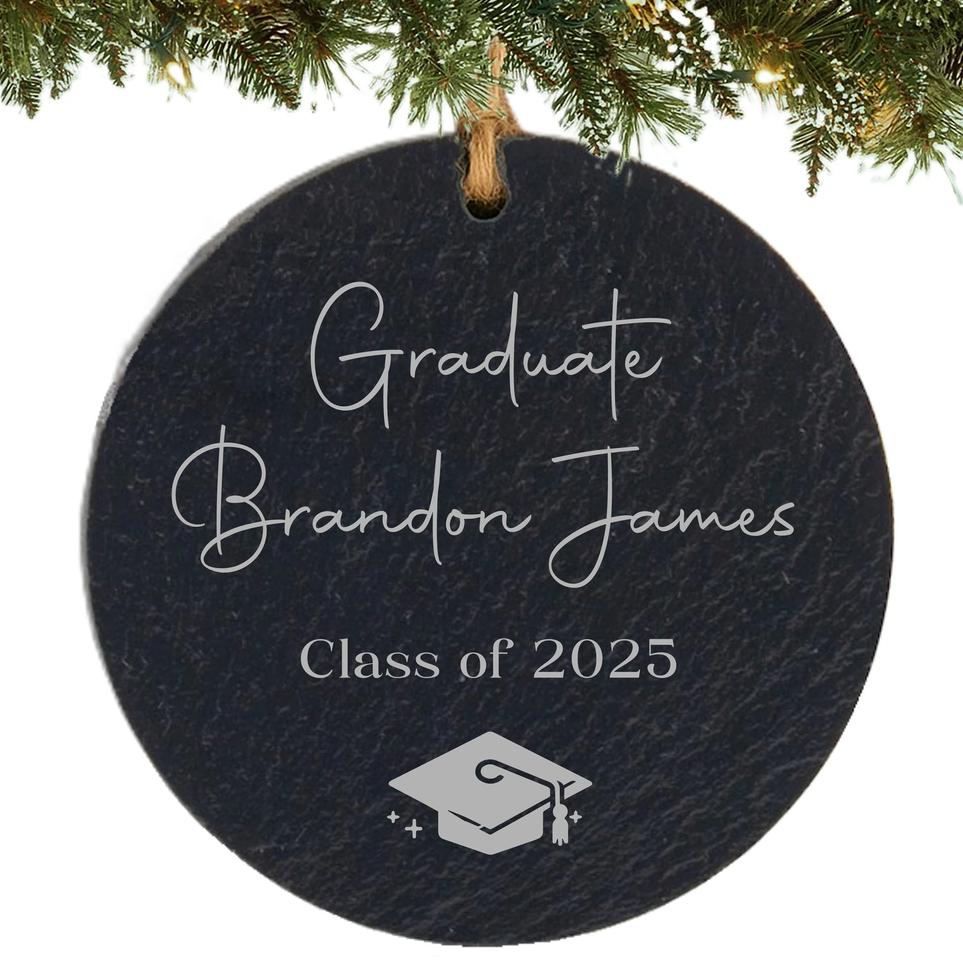 Slate ornament engraved with “Graduate,” student’s name, class year, and graduation cap icon.