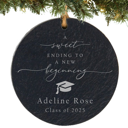Slate ornament engraved with inspirational graduation quote, graduation cap icon, graduate’s name, and class year.