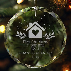 Personalized first Christmas in new home glass ornament, laser engraved with a family name and year