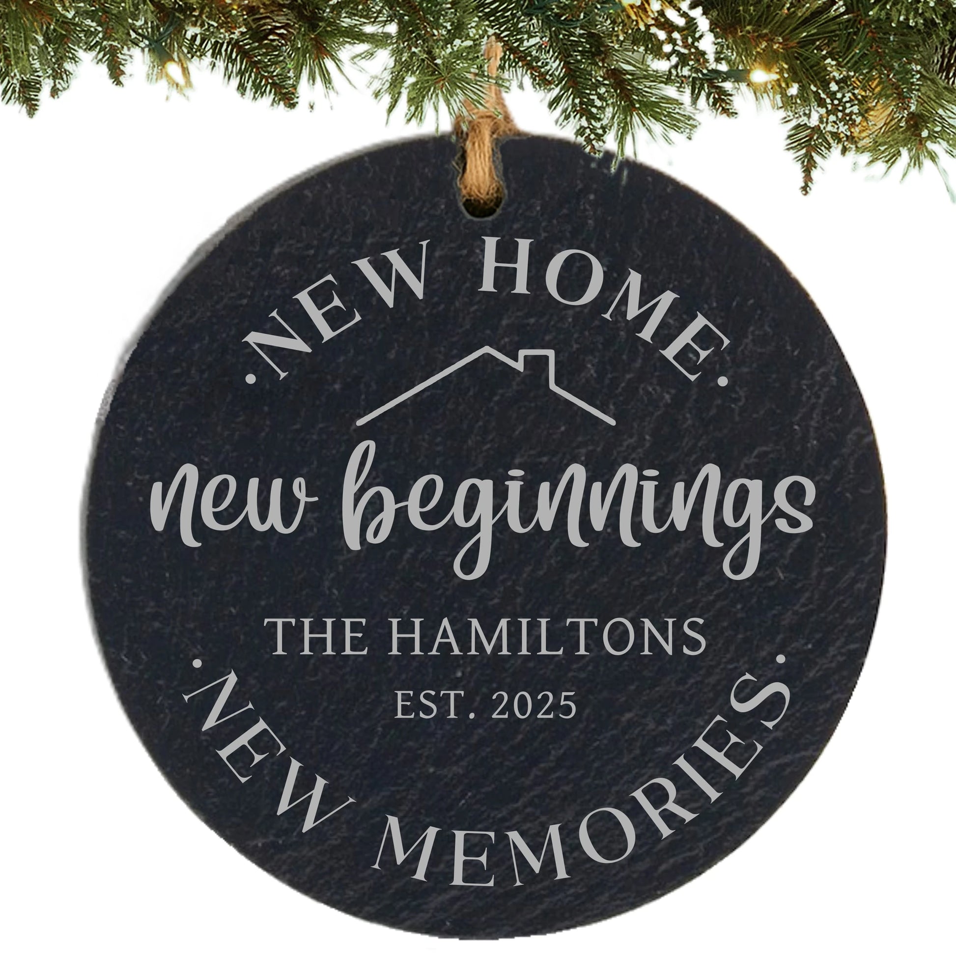 Slate ornament engraved with “New Home, New Beginnings, New Memories,” house outline, family name, and established year.