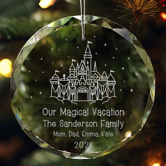 Crystal ornament engraved with castle design, family names, and vacation text