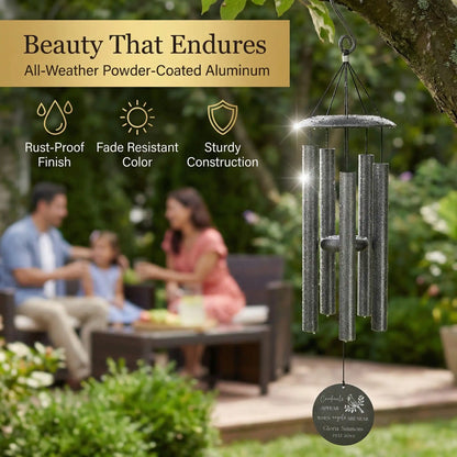 Black aluminum cardinal memorial wind chime hanging outdoors in garden, rust-proof fade-resistant powder coated finish, personalized disc with name and years