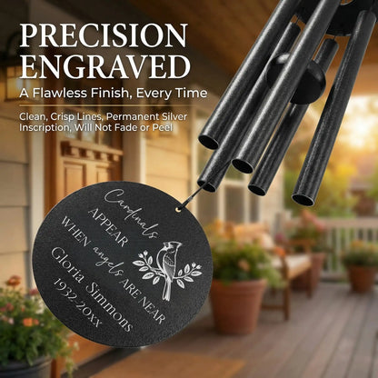 Close up of precision laser engraved cardinal wind chime disc, permanent silver inscription with Cardinals Appear When Angels Are Near design, custom name and years, will not fade or peel
