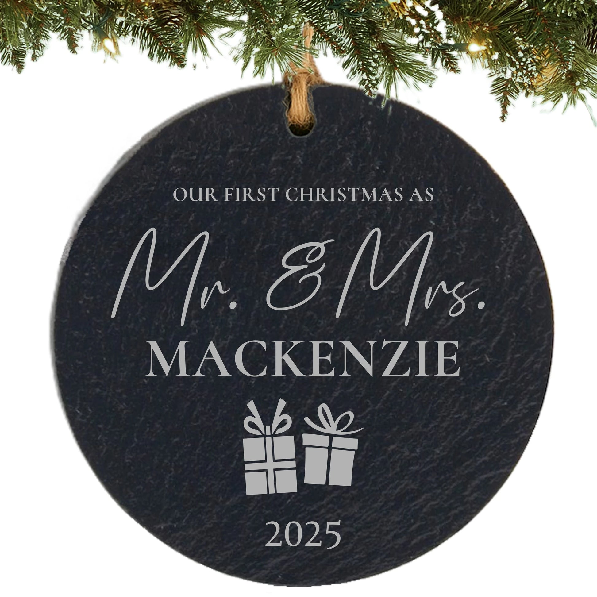 Slate ornament engraved with “Our First Christmas as Mr. & Mrs.,” last name, gift icons, and year.