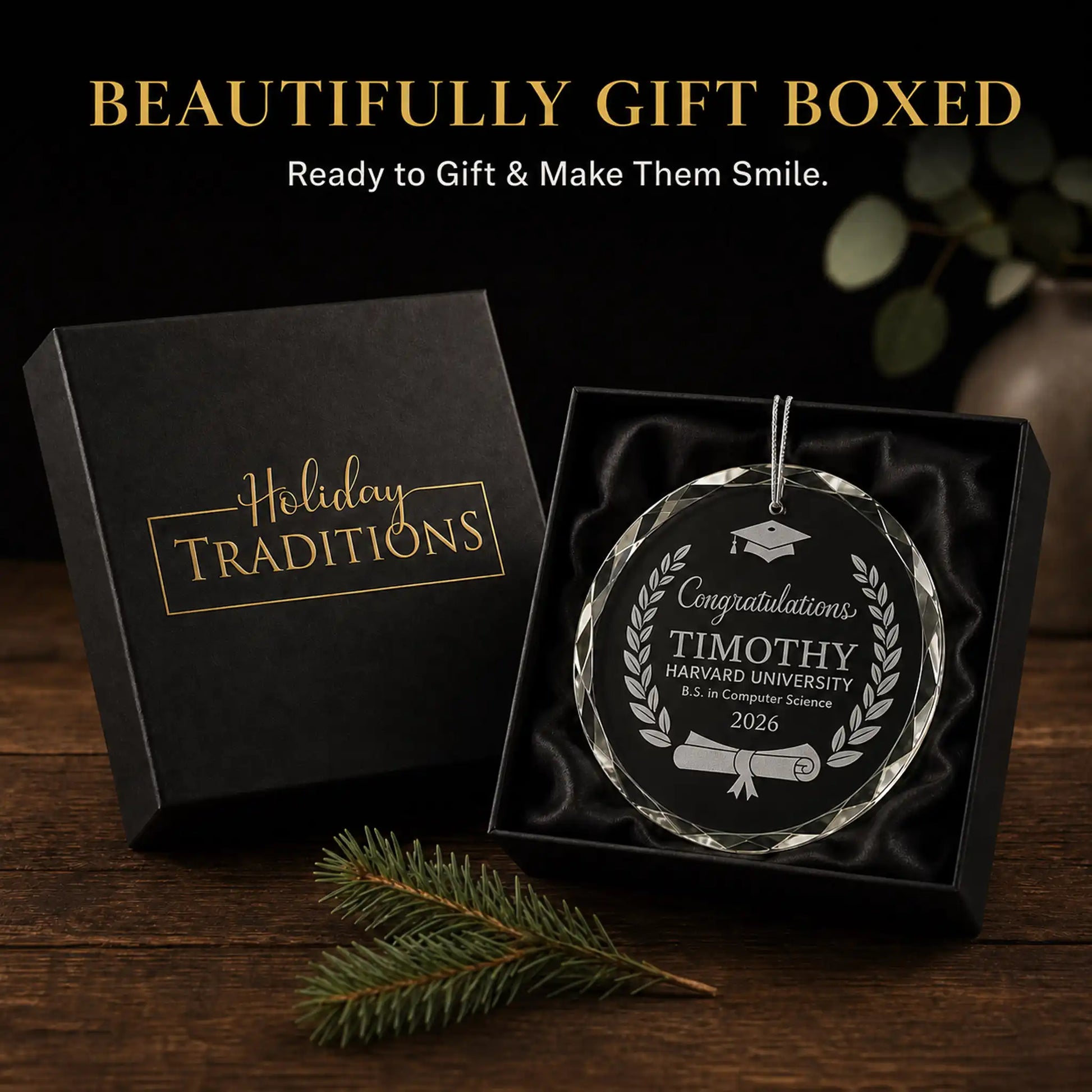 Laurel wreath cap and diploma personalized graduation glass ornament arrives in a black Holiday Traditions gift box, ready to give