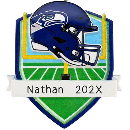 Seattle Seahawks personalized Christmas ornament with team helmet over goal post and laser-engraved banner