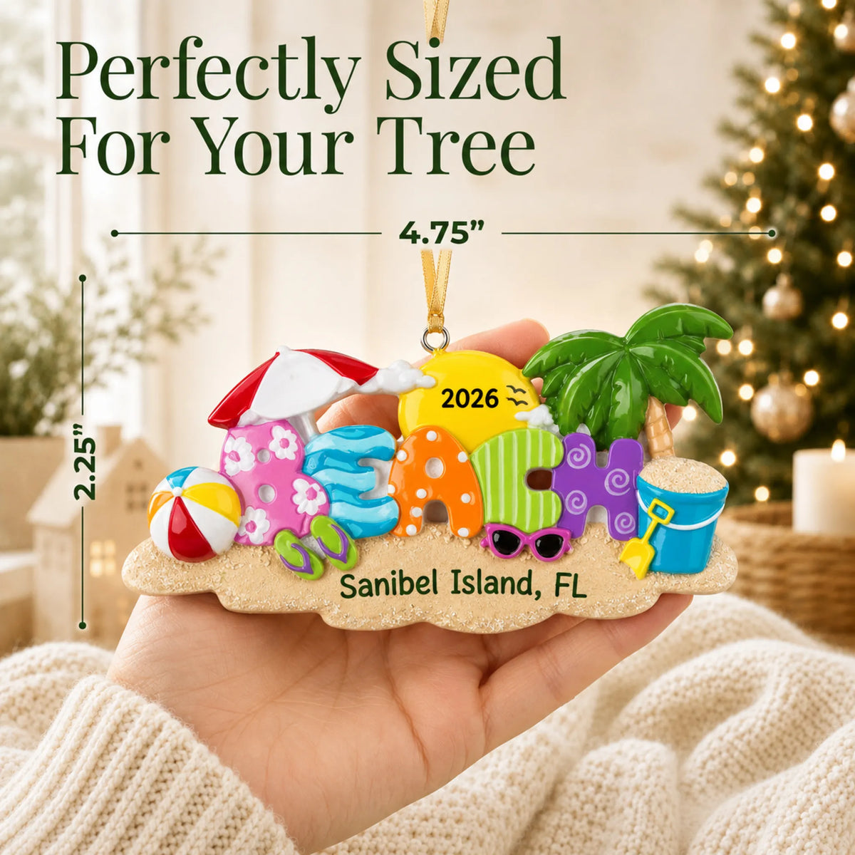 Size guide: the personalized beach fun christmas ornament is 4.75 in wide by 2.25 in tall, shown in hand