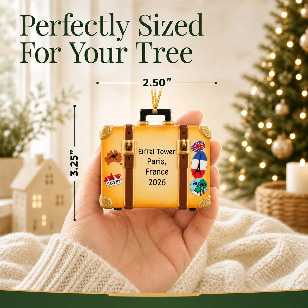 Size guide: the personalized tan travel suitcase christmas ornament is 2.50 in wide by 3.25 in tall, shown in hand