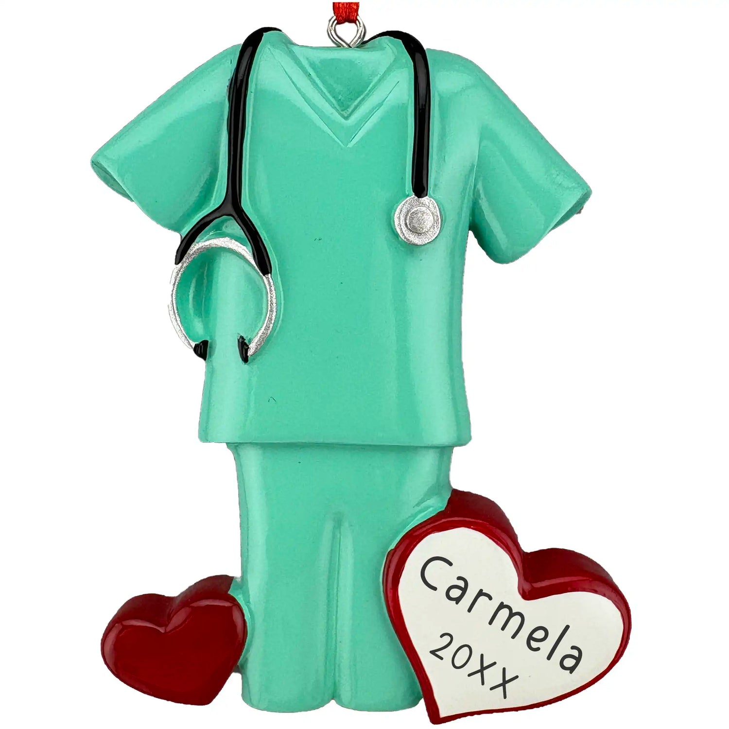 Personalized ornament in the shape of a medical scrub set with a stethoscope and heart-shaped tag on a white background