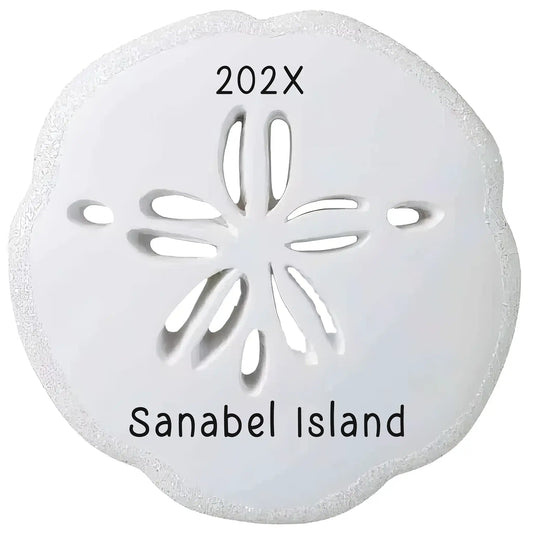 Personalized sand dollar Christmas ornament with a textured white sand dollar, laser engraved with a custom message and the year.